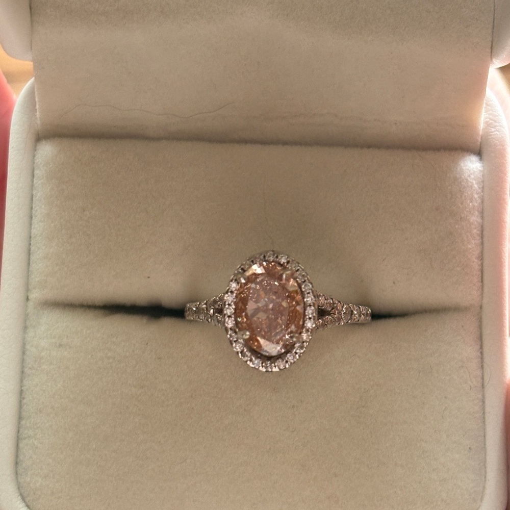 Dazzling 18kt white gold and Pink oval diamond engagement ring.